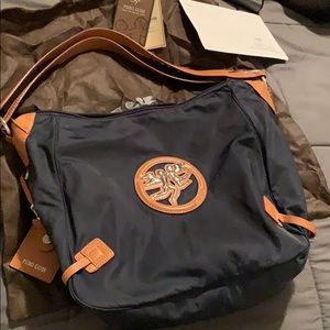 Piero guidi nylon discovery handbag